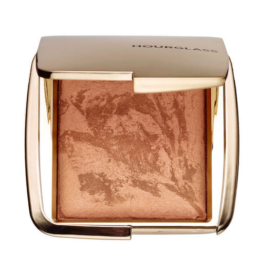 Hourglass Ambient® Lighting Bronzer | Luminous Bronze Light - a medium bronze shade fused with Luminous Light for a softer, candlelit warmth